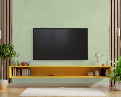 Pixie Green Color Simple Wallpaper Mural A20011500 behind TV